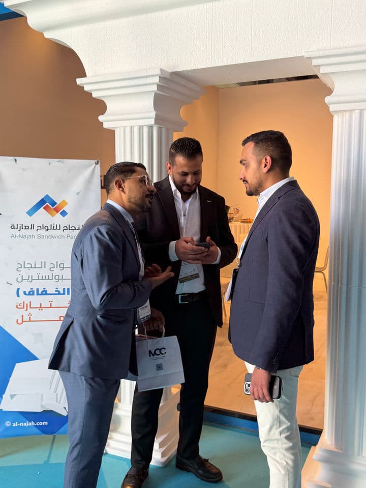 Visitors talking at Libya Build